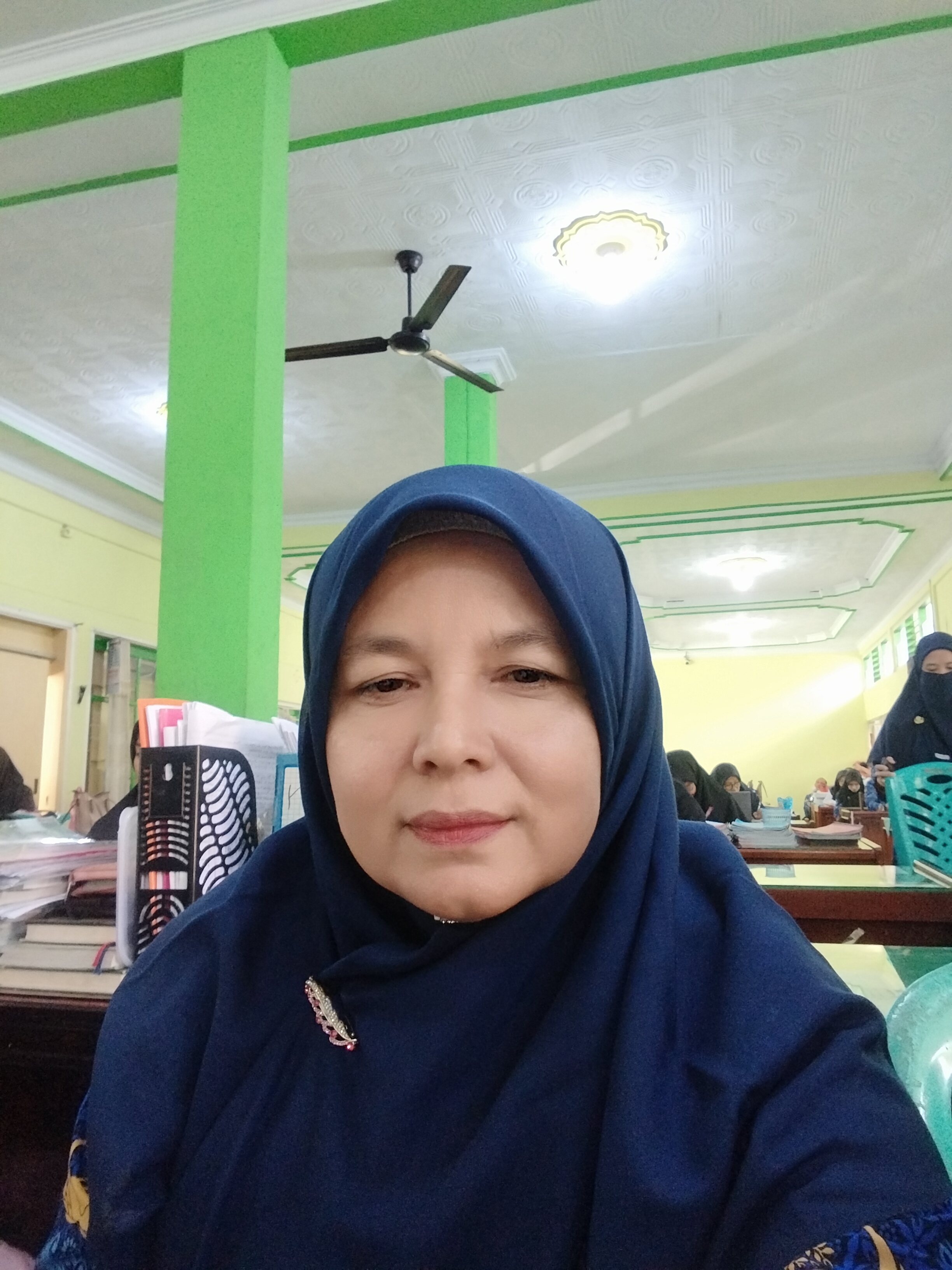 Ernadia Lismar, S.Ag.